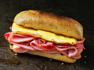 rustic deli cold cuts sandwich