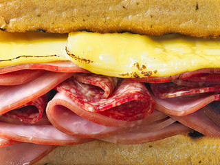 rustic deli cold cuts sandwich