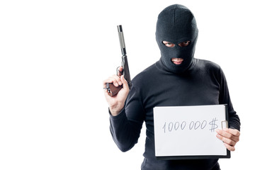 thief with the weapon shows the sum of the ransom for the hostage