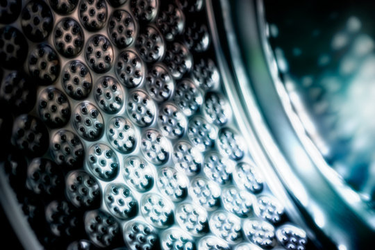 Washing machine / Inside of washing machine, abstract blur background. Dark tone.