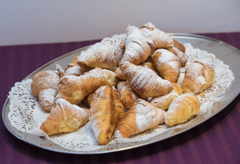 Powdered croissant for breakfast