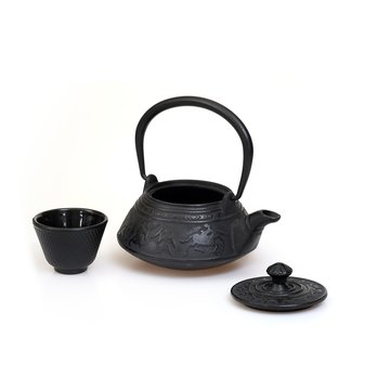 Cast iron Chinese teapot for tea on white background