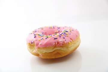 Strawberry chocolate donut isolated in white background