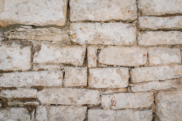 rustic ancient handcraft tile stack stone wall as background in Italy