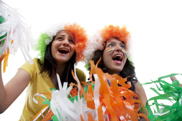Girls with wigs cheering 