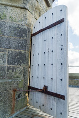 Wooden door on a Castle in Cornwall in the summertime