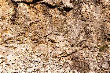 Stone cliffs in the mountains as a background