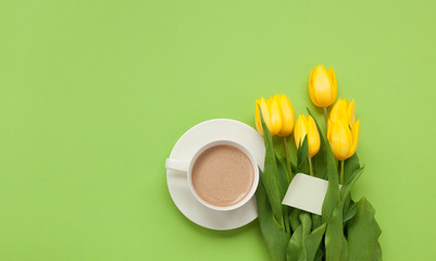Latte cup and flowers bunch
