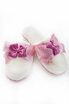 Pair of blank white home slippers. Bed shoes accessory footwear