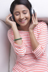 Young WOMEN listening to music