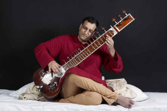 Man playing the sitar 
