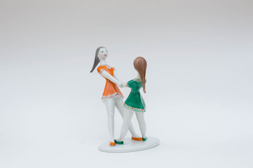 Two girl dancing porcelain figurine