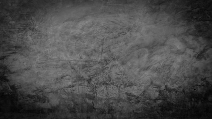 Fototapeta premium Grunge grainy dark concrete cement wall background.