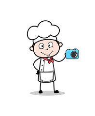 Cartoon Chef Showing a Good Quality Camera Vector Illustration