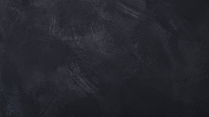 Closeup of dark grunge textured concrete background