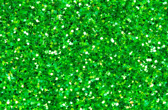 Green Abstract Background. Green Glitter Closeup Photo. Green Shimmer Wrapping Paper.