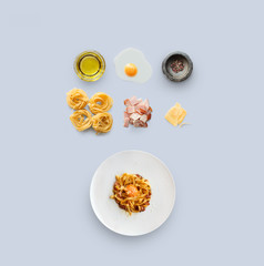 Cooking ingredients for italian food, carbonara, isolated on blue background