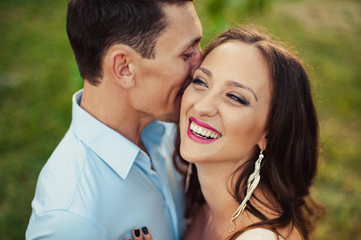 Fototapeta premium Young loving couple walking in the park