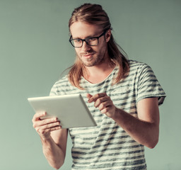 Young man with gadget