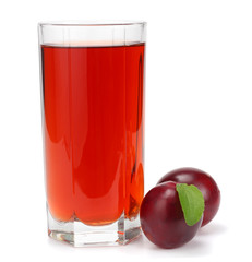 fresh plum fruit with juice isolated on white background