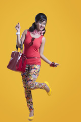 Retro woman with hand bag smiling