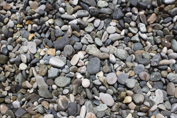 Nature background from gray sea pebbles