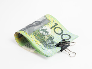 Australia banknotes with money clip on white background.