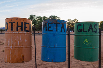 African colorful  trash cans on a camp site in  the Namib dessert