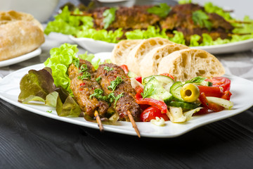 Skewers of minced meat