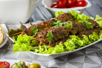 Skewers of minced meat