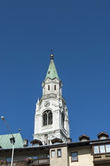 Obraz premium Autumnal corso Italia, the Church or Synagogue in the town center of Cortina d'Ampezzo, Dolomite, Alps, Veneto, Italy, Europe