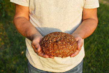 bread in his hands