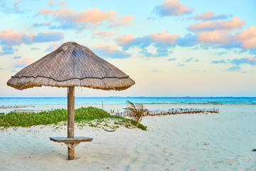 Umbrella parasol at Isla Mujeres in early morning hours - Tropical Holiday Banner