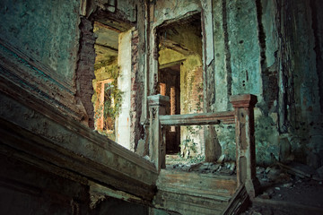 Fototapeta na wymiar Creepy ruined and overgrown by plants interior of old mansion. Life after humanity post-apocalyptic concept
