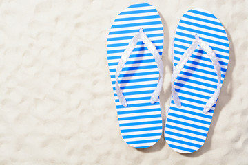 Flip flops on sand