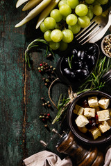 Tasty Italian Greek Mediterranean Food Ingredients Top View on Green Old Rustic Table Above