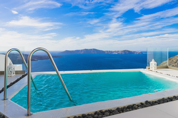 Fototapeta na wymiar A beautiful swimming pool at Santorini island, Greece