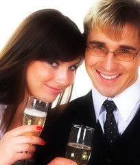 happy couple smiling over a white background