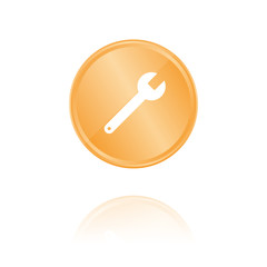 Schraubenschlüssel Bronze Münze mit Reflektion