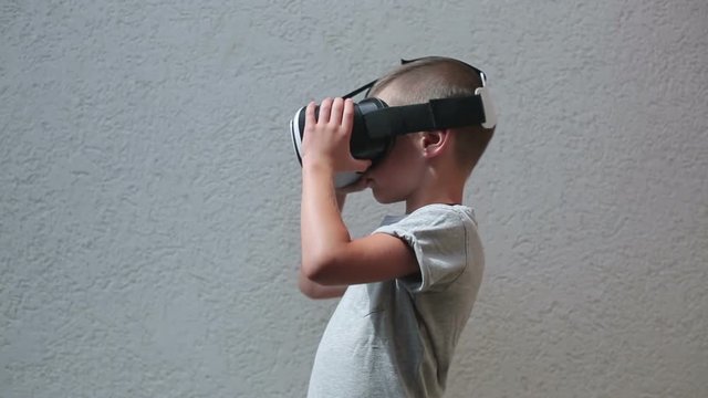 Child with VR Headset watching
