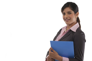 Portrait of a businesswoman with a file 
