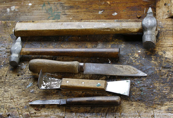 Old tools on a workbench