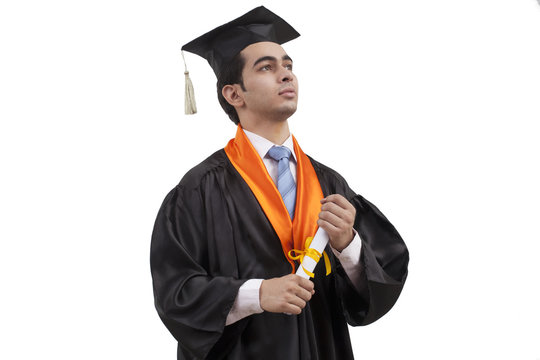 Portrait of a boy at graduation ceremony