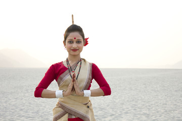 Portrait of a Bihu dancer greeting 