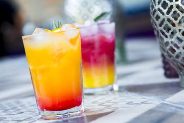 Cocktail with orange juice and ice cubes , Tequi