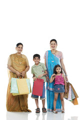 Gujarati family with shopping bags 