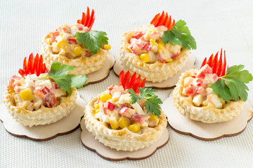 Festive appetizer vol-au-vent with chicken salad, sweet pepper, corn