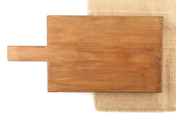 Wooden board with napkin on white background