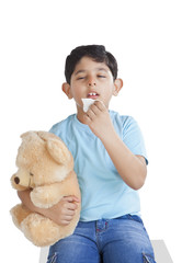 Little boy about to sneeze