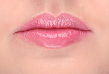Fototapeta premium Lips of beautiful young woman, closeup